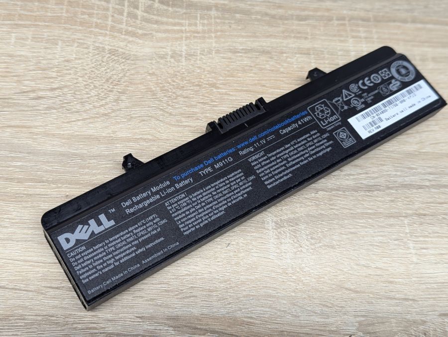 Б/В Оригінальна акумуляторна батарея Dell M911G