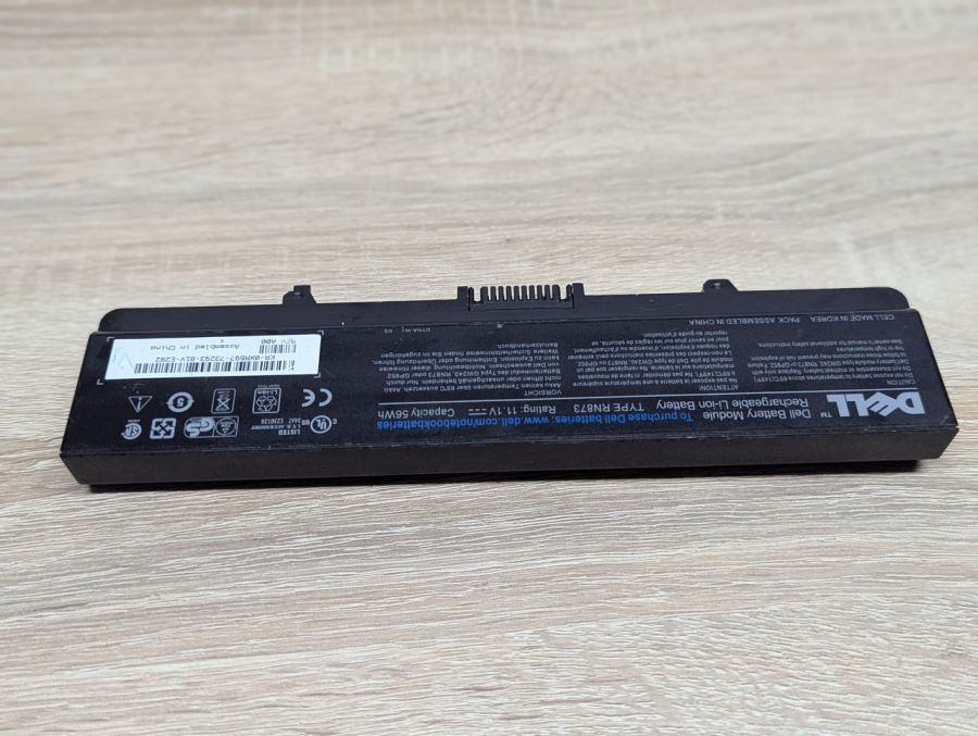 Б/В Оригінальна акумуляторна батарея Dell RN873