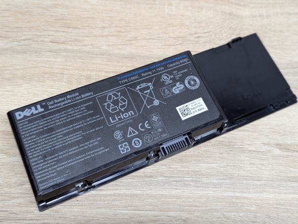 Б/В Оригінальна акумуляторна батарея Dell C565C