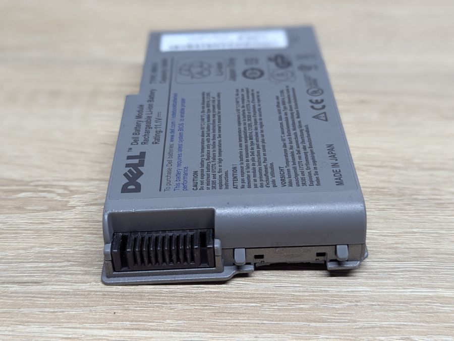 Б/В Акумуляторна батарея Dell M9014