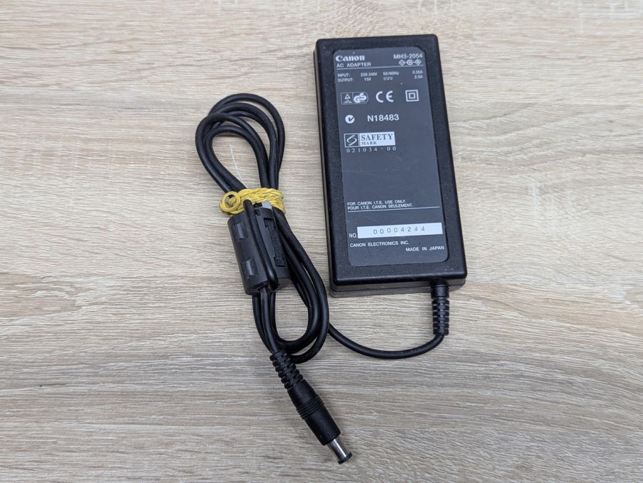 Б/В Блок живлення Canon MH3-2054,30 Вт,15В,2.0А,6.0x4.4 м [ProductHub SKU MH3-2054]