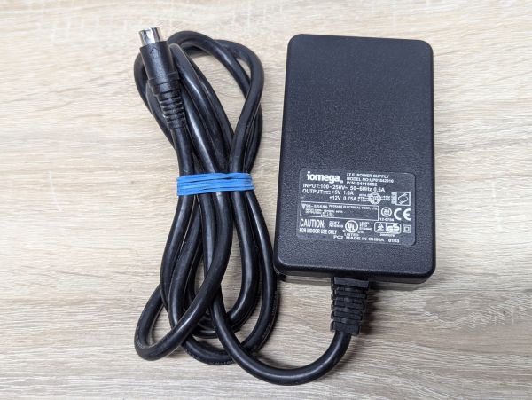 Б/В Блок живлення Iomega UP01842010,+5V (1.0A),+12V (0.75A),Mini-DIN 5 pin