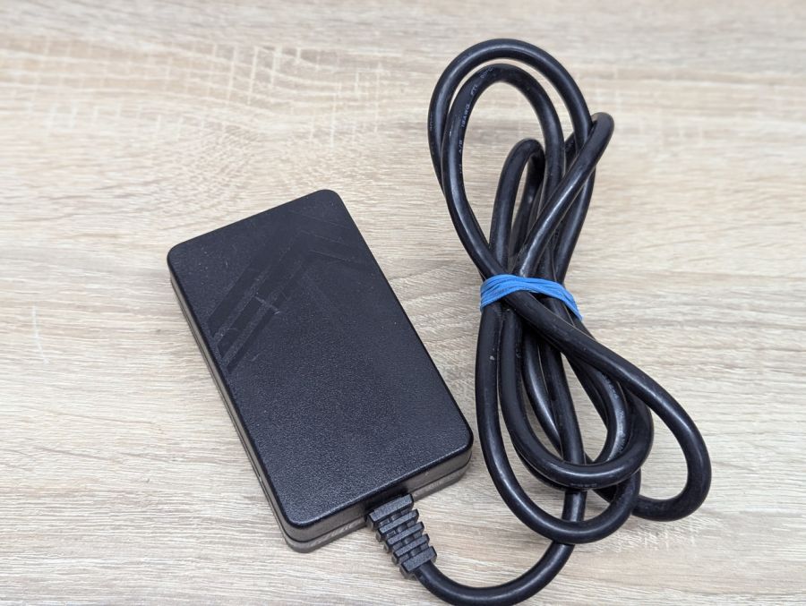 Б/В Блок живлення Iomega UP01842010,+5V (1.0A),+12V (0.75A),Mini-DIN 5 pin