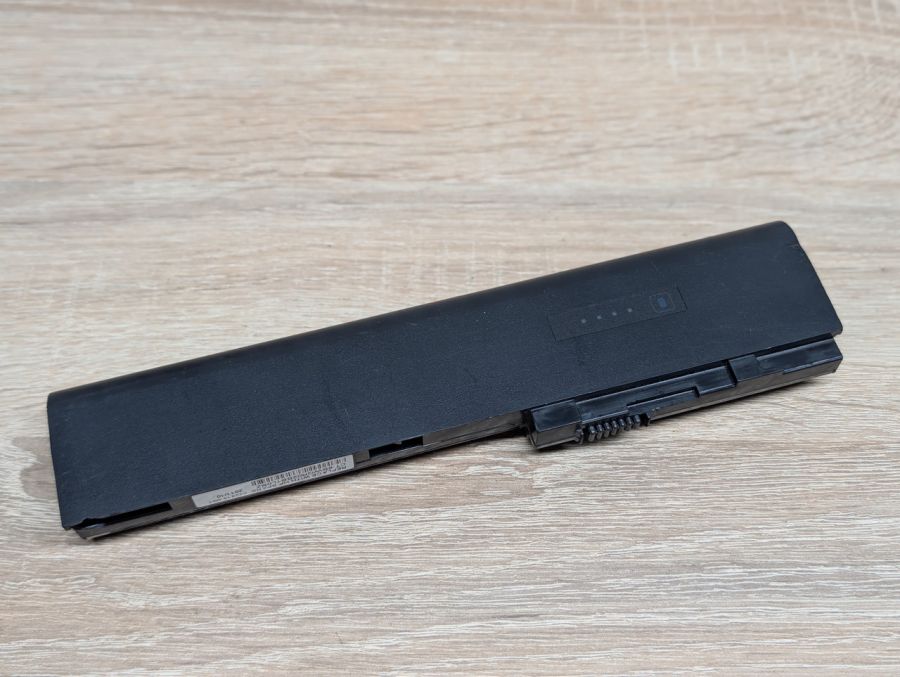 Б/В Оригінальна акумуляторна батарея HP SX06